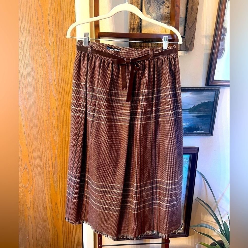Panther Vintage Skirt
Womens Med/L Plaid Wool Fringe Western Modest Midi Pleated